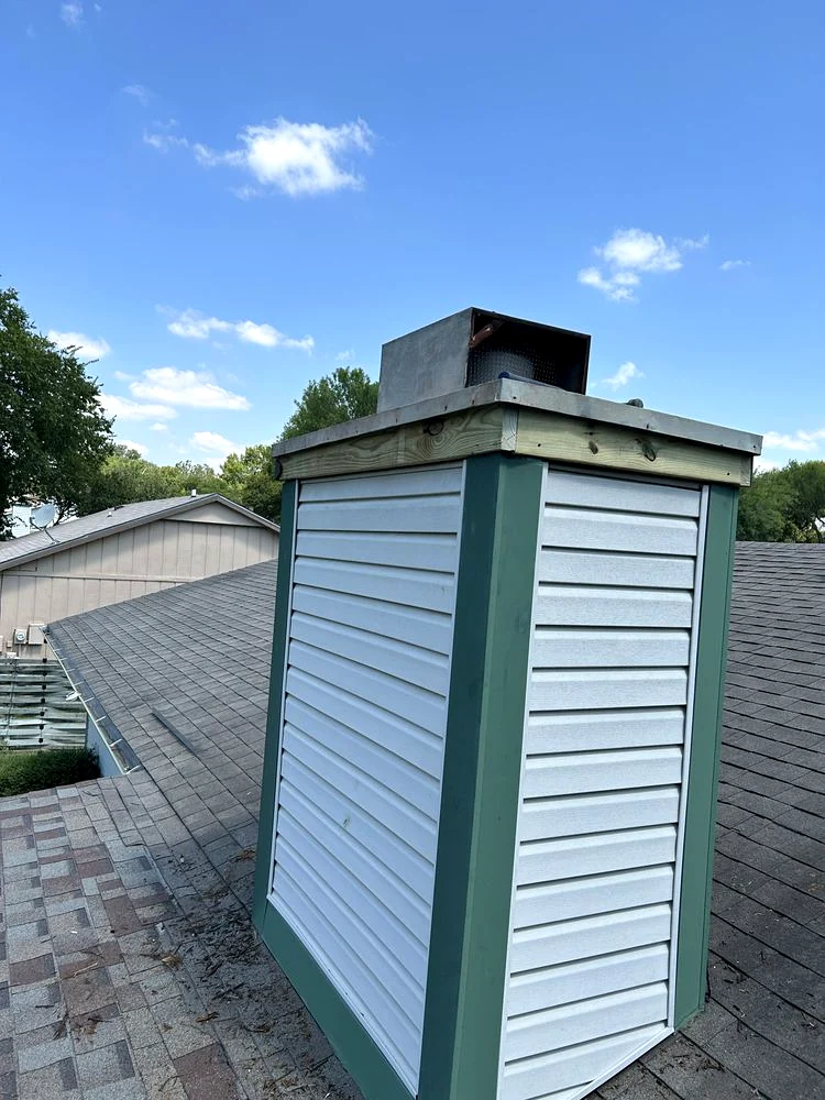 After: the chimney enclosure with replacement upper trim.